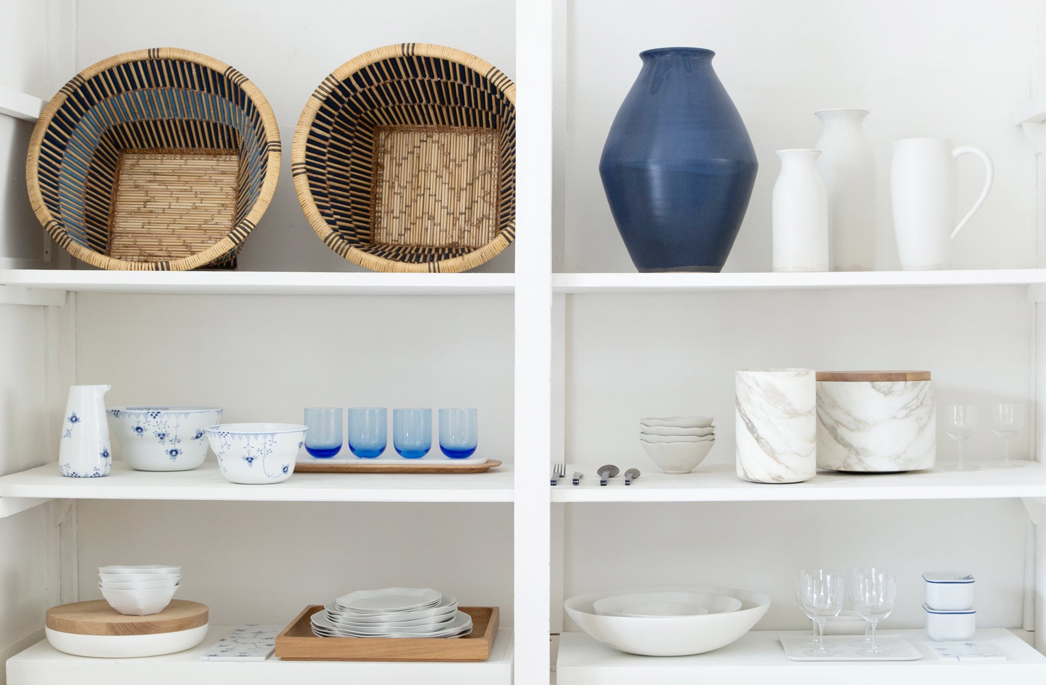 MARCH cabinet with blue and white accessories.