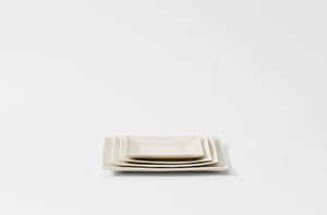 Christiane Perrochon nested powder white dinnerware. Default
