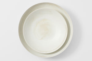 Christiane Perrochon white beige large low serving bowl nested.