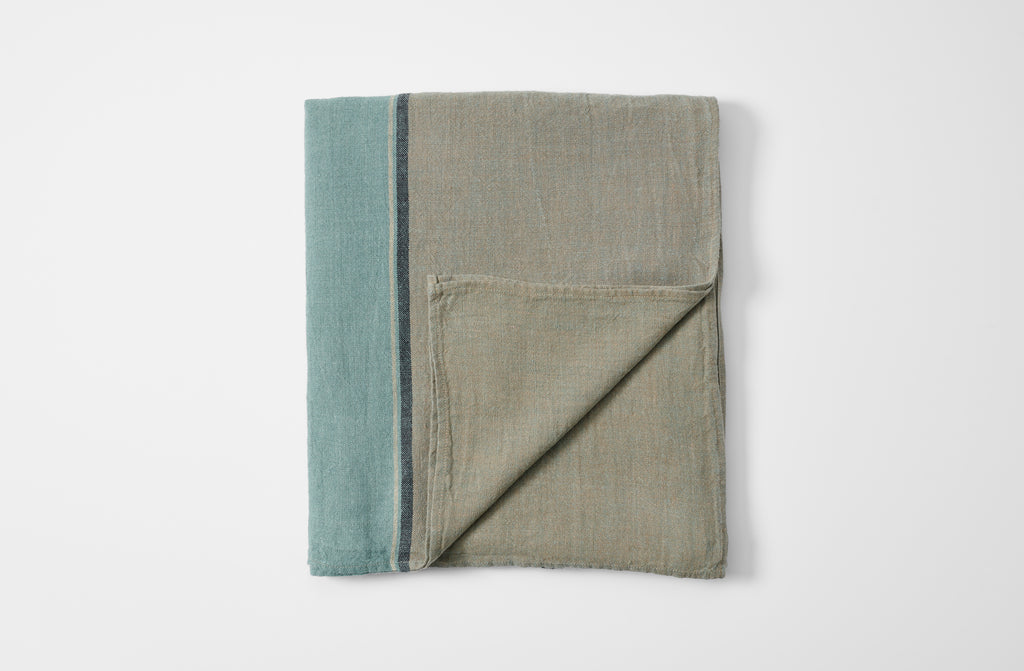 Dublin linen tablecloth folded with detail of reverse.
