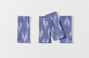 Group of four Gregory Parkinson azul triangle napkins