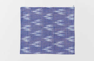 Single open Gregory Parkinson azul triangle napkin