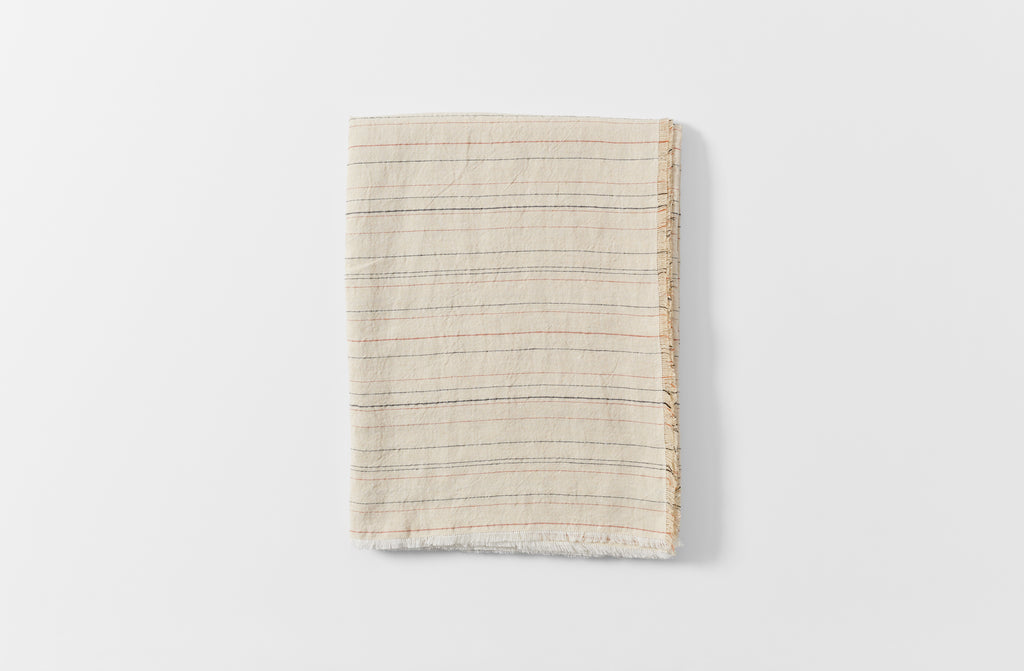 Greta natural stripe tablecloth folded