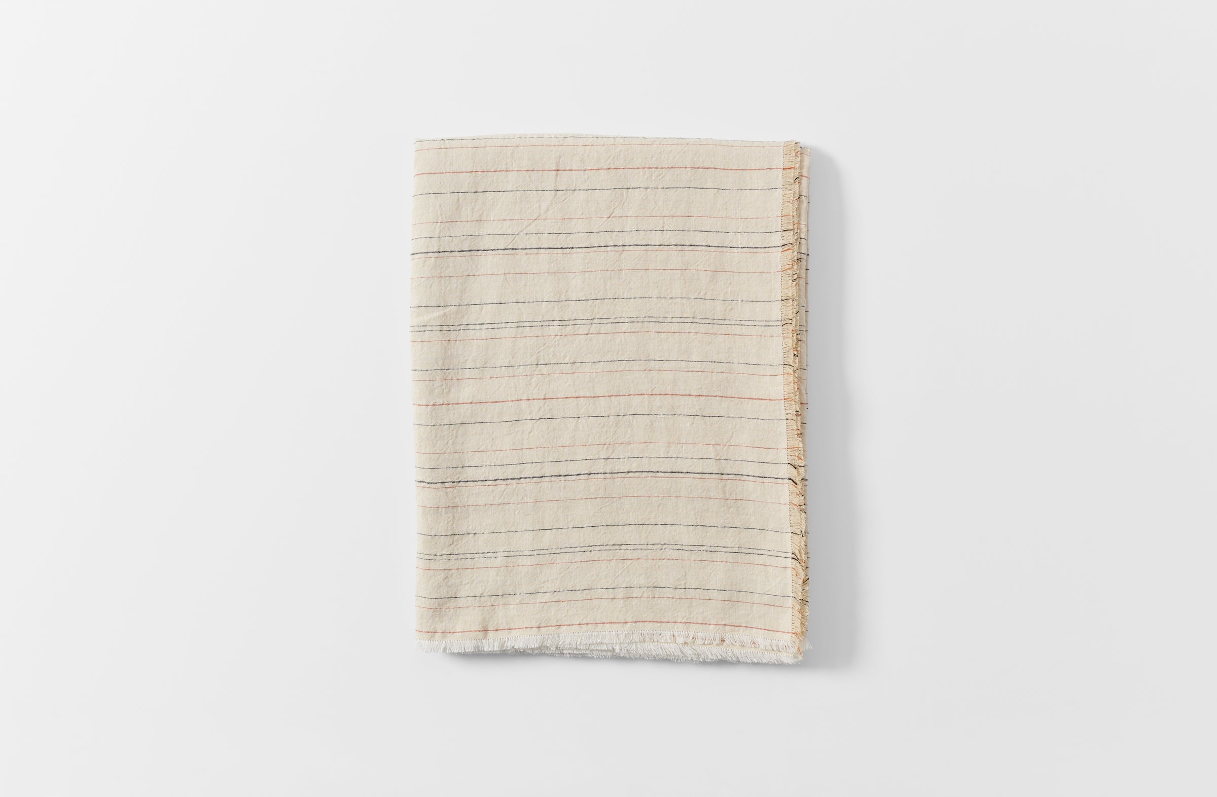 Greta natural stripe tablecloth folded