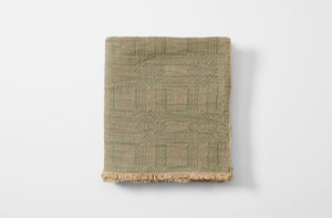 Homespun sage green tablecloth folded