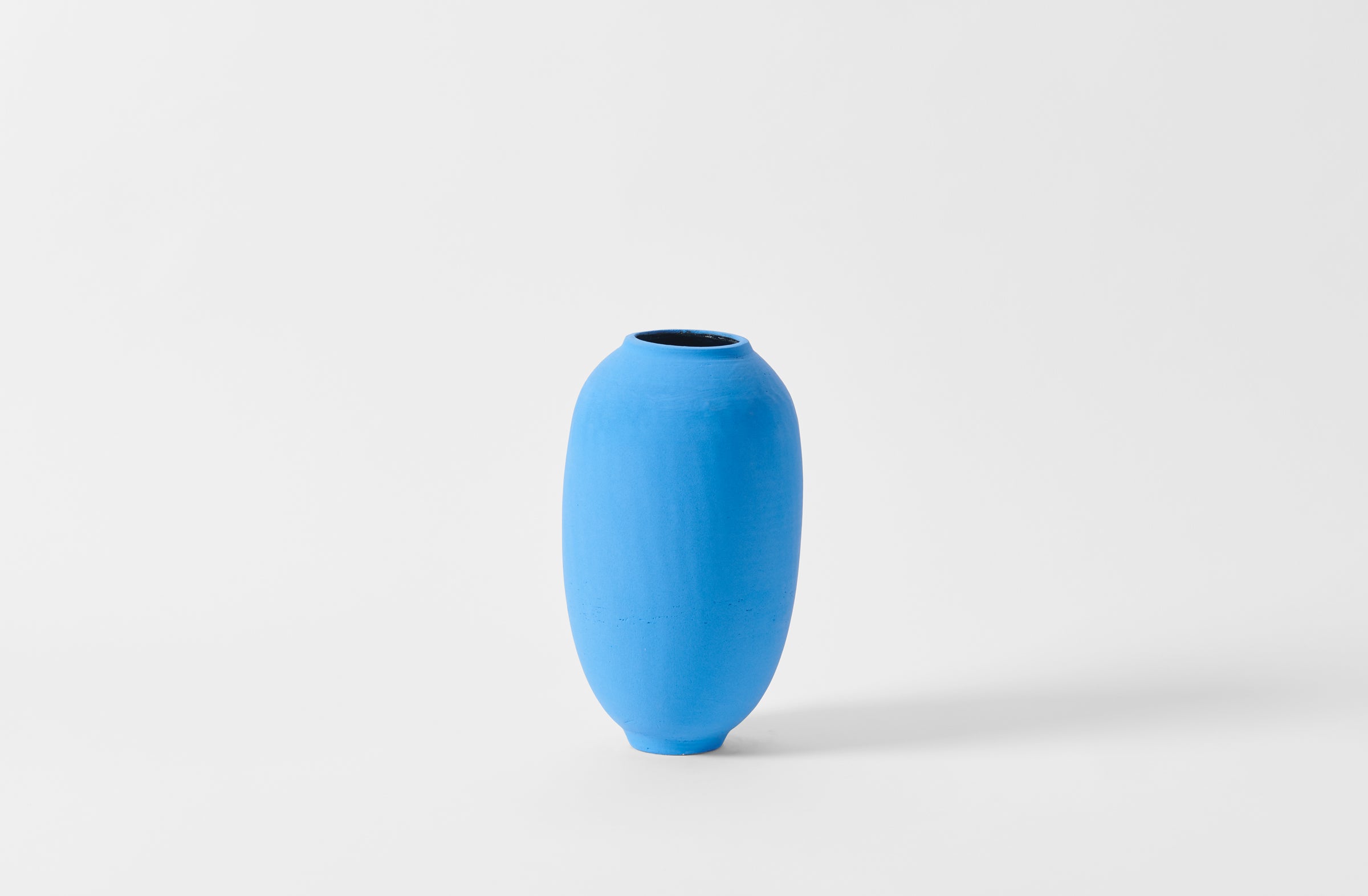Karen Swami blue slip tall vessel