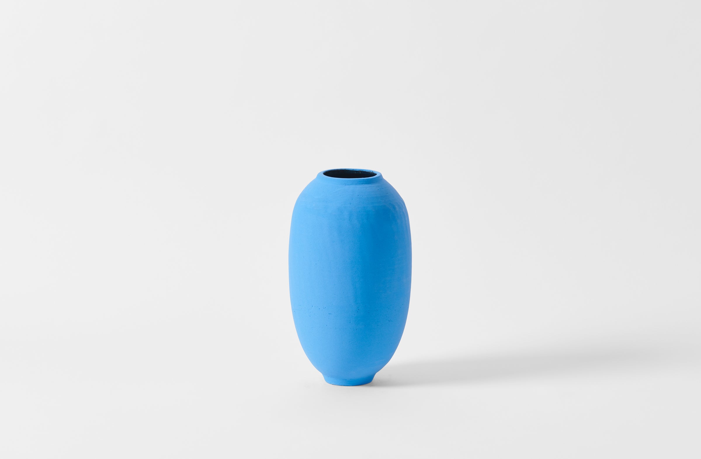 Karen Swami blue slip tall vessel