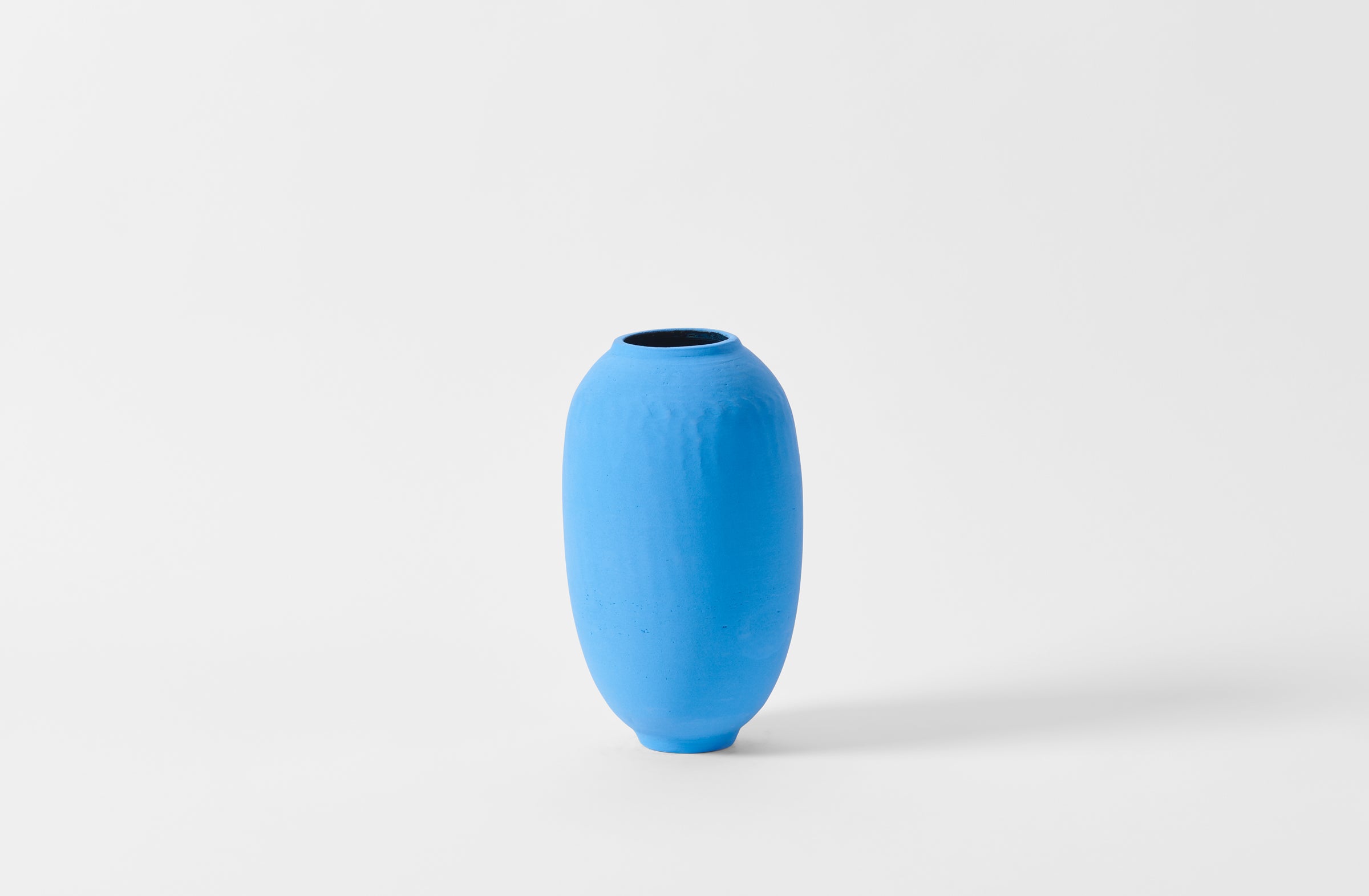 Karen Swami blue slip tall vessel