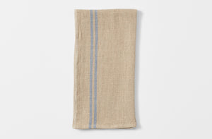 Folded natural blue country kitchen towel.