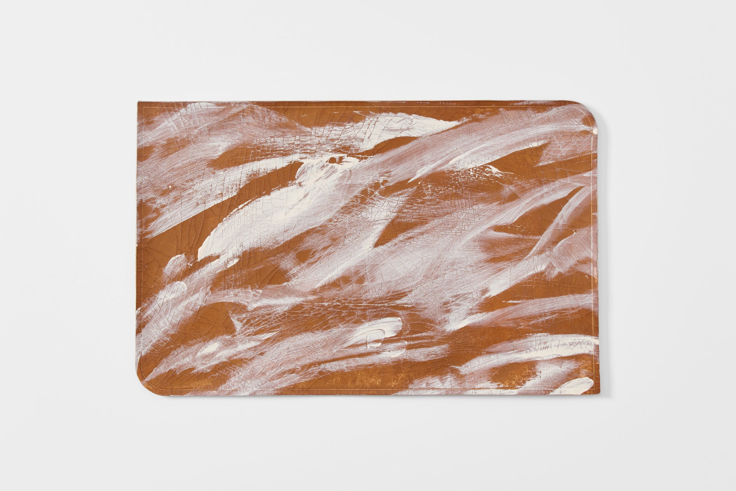 Peter Speliopoulos gesso crackle leather placemat.