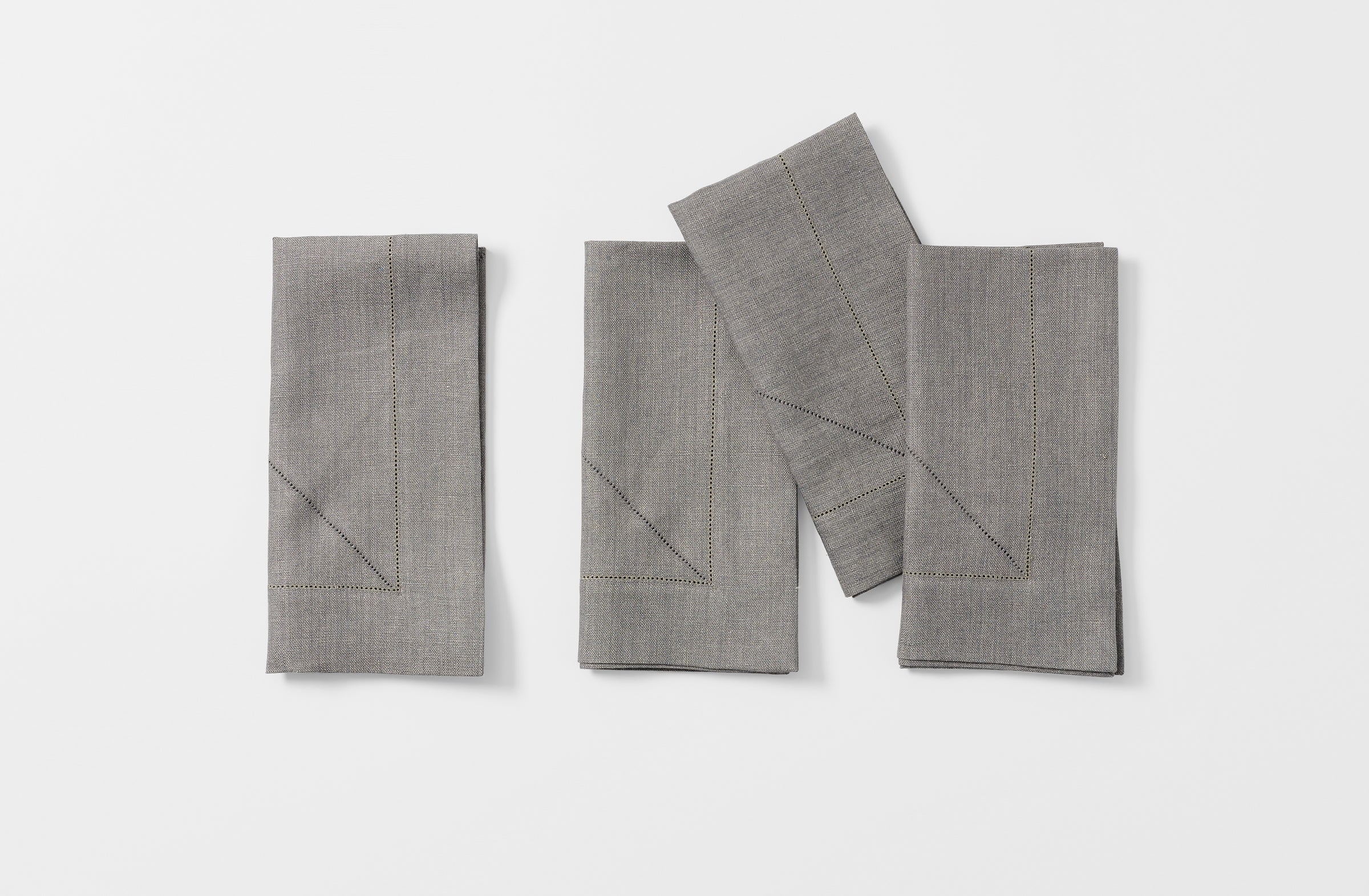 Four Peter Speliopoulos granite linen hemstitch napkins