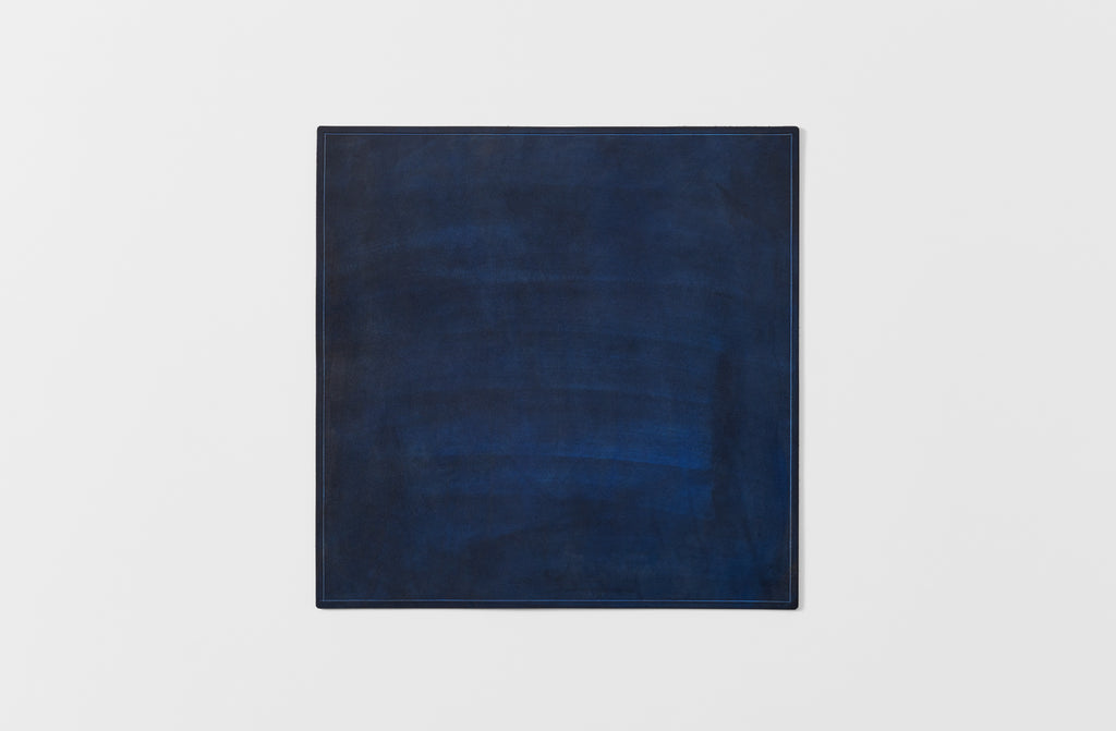 Peter Speliopoulos indigo painted leather placemat