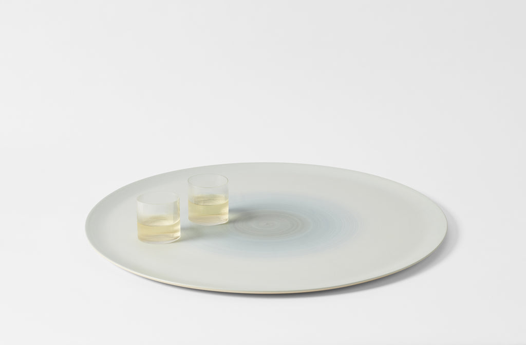 Rina Menardi Extra Large round peel with Melina Kling Circle glasses.