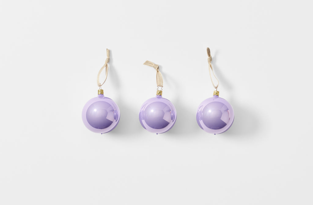 Set of three thistle glass ball ornaments strung with linen tape