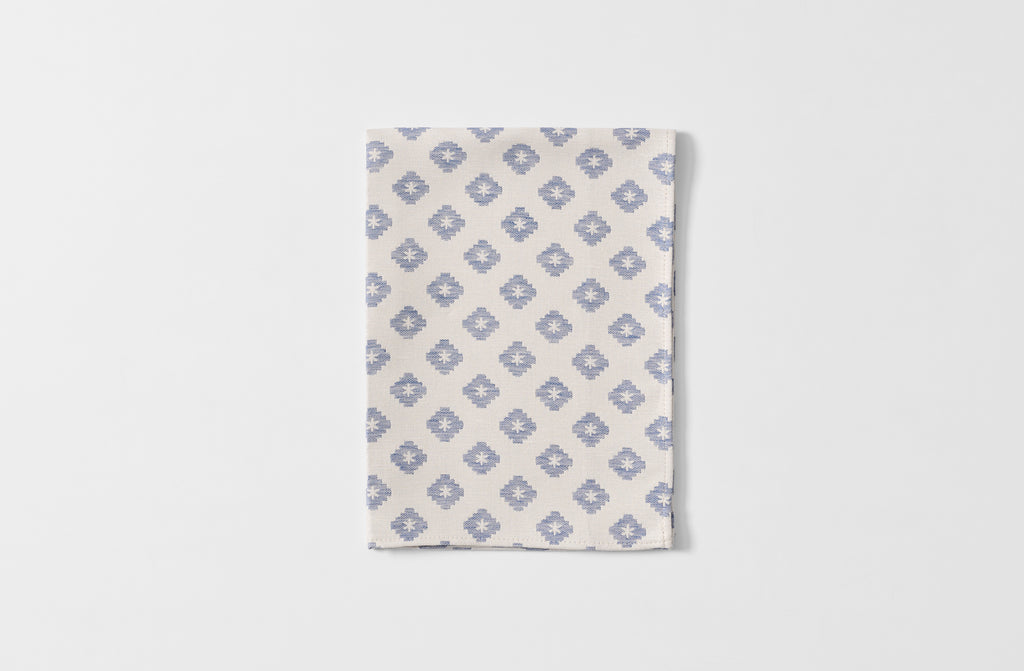 Folded Tori Murphy indigo diamond kitchen towel.