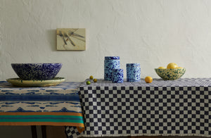 Abutting-Tables-with-Contrasting-Lisa-Corti -and-Chiarastella-Castanada-Tablecloths-and-splatterware-on-top