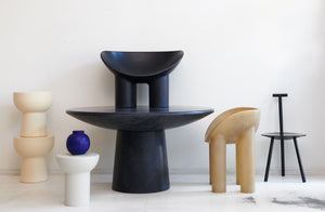 At-MARCH-San-Francisco-faye-toogood-roly-poly-and-spade-furniture-stacked-en-masse-with-christiane-perrochon-blue-violet-boule-on-side-table