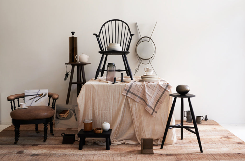 MARCH-vintage-furniture-and-objects-stacked-like-a-flea-market-booth