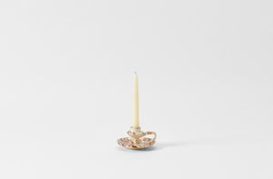 brown on cream splatterware chamberstick candleholder with taper candle