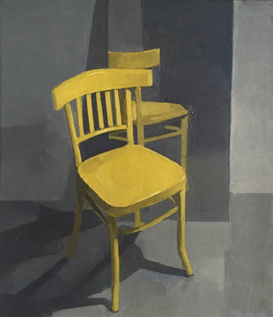 Yellow Chair Against a Mirror