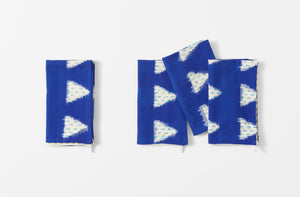 four folded gregory parkinson indigo sky napkins