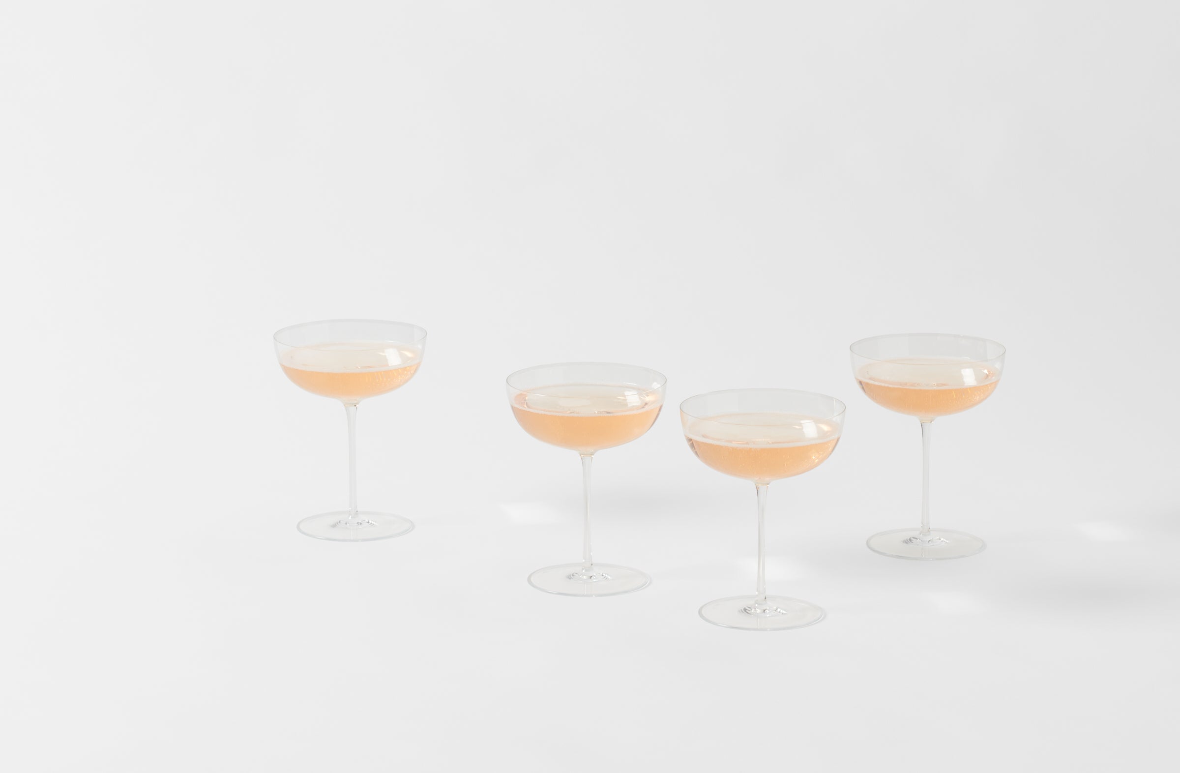 lobmeyr polka champagne cup with sparkling red in multiple glasses
