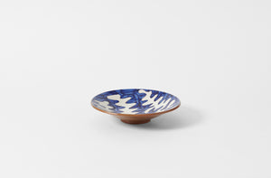 malaika hand painted ceramic matisse patterned pasta bowl in blue and white on brown