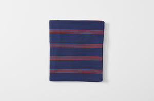 tensira navy and red stripe tablecloth shown folded