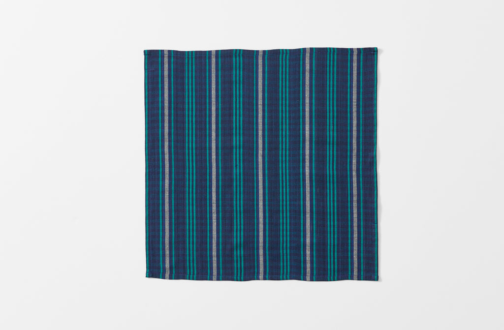single tensira navy and green tartan napkin shown unfolded