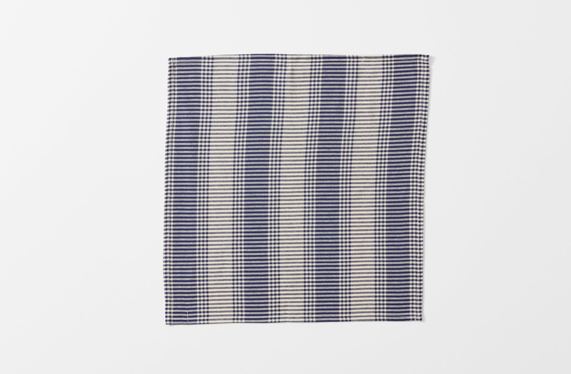 single tensira navy and natural tartan napkin shown unfolded