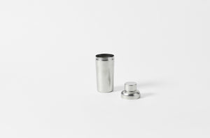 stile pewter cocktail shaker in a matte finish with the lid off and to one side
