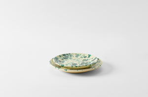 Two ceramic green on cream MARCH Splatterware plates on a white background. Default 