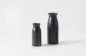 Two black Christiane Perrochon vases in medium and large on a white background. Default