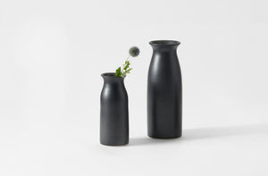 Two black Christiane Perrochon vases in medium and large on a white background. Default