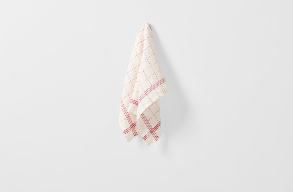 Red and white bistrot kitchen towel hanging