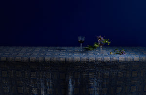 Lobmeyr Poppea goblet on homespun blue tablecloth with flower