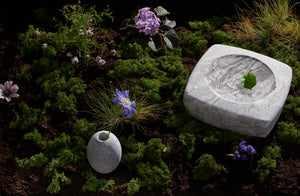 Michael Verheyden mondragone vessels in mossy still life landscape with purple flowers