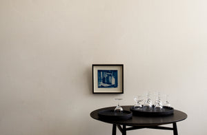 Sawkille table with Michaël Verheyden black leather trays and Lobmeyr glassware in front of Susan Ashworth cyanotype. Default