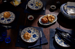 Peter Speliopolous denim placemats and napkins with blue folk plates