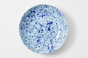 Seventeen inch blue on blue splatterware serving platter overhead.