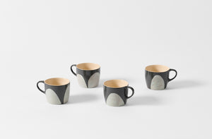 Four Brickett Davda marbled mugs.