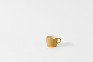 Brickett Davda Mustard Mug