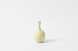 Christiane Perrochon pale yellow small bottle vase.