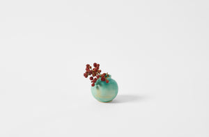 Turquoise Christiane Perrochon petite boule vase holding blackberries