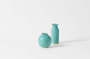 Christiane Perrochon medium turquoise bottle vase and boule.