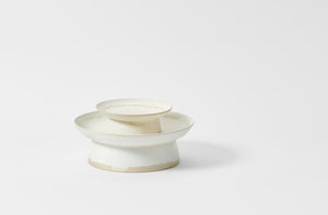 Christiane Perrochon nested white beige cake stands stacked. Default