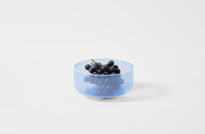 Davide Fuin blue filigree low bowl holding grapes