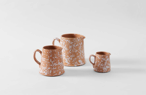 White on Terracotta Splatterware Pitchers