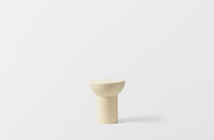 Faye TooGood cream Roly Poly side table.