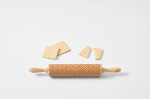 Folk tile patterned rolling pin with cookies